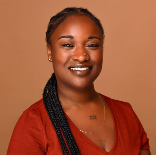 Jasmin Johnson african-american black doula smiling